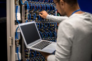 network-engineer-connecting-servers-2021-09-24-03-57-11-utc