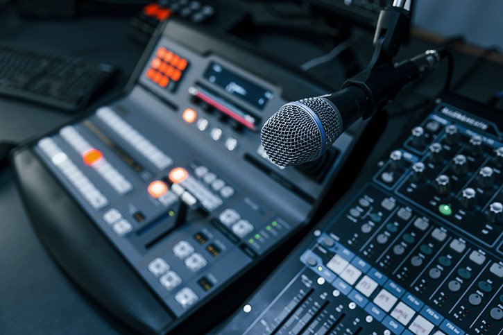 close-up-view-of-radio-mixing-desk-with-profession-2023-11-27-05-28-53-utc
